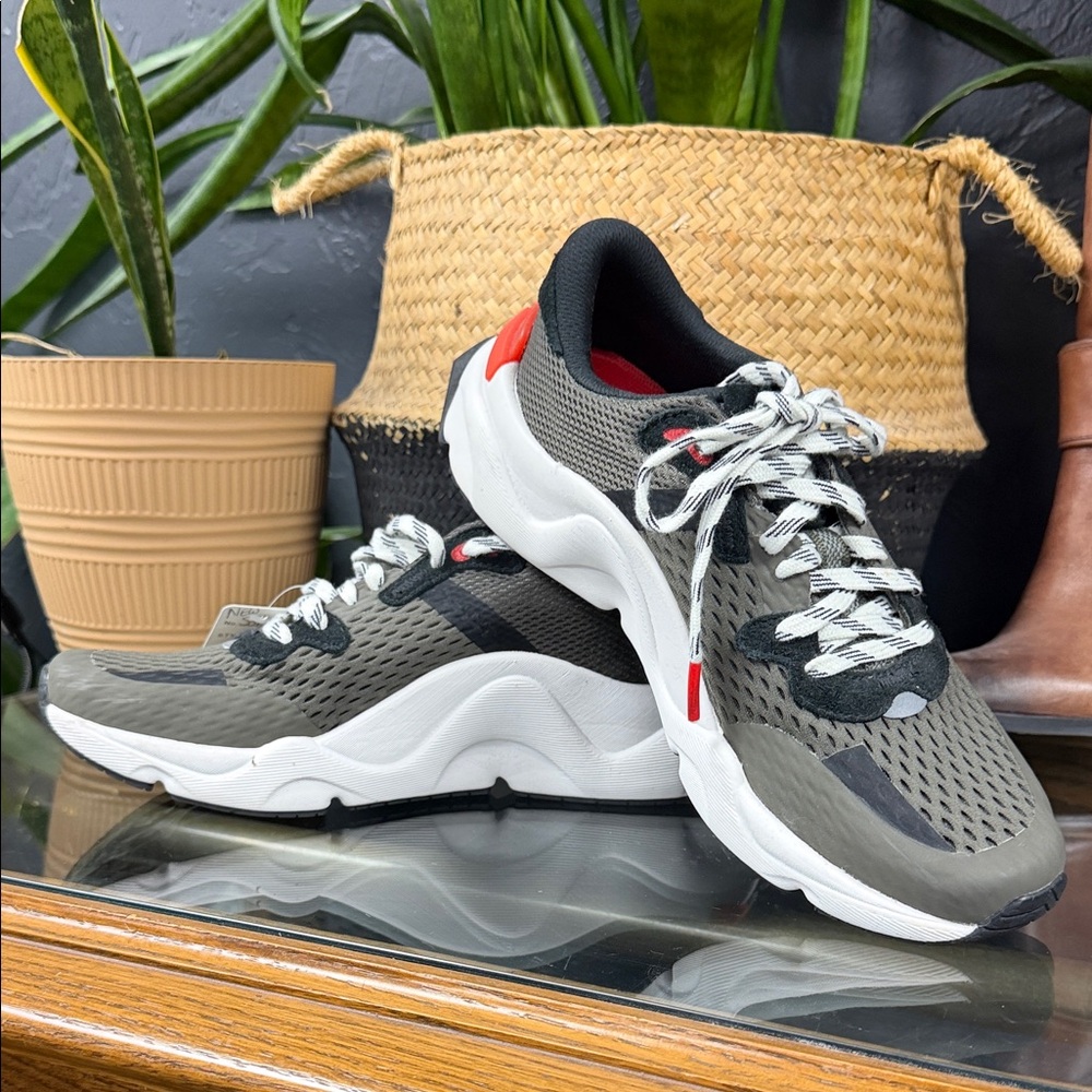 Sorel womens Gray and Black Sneakers with Red Accents